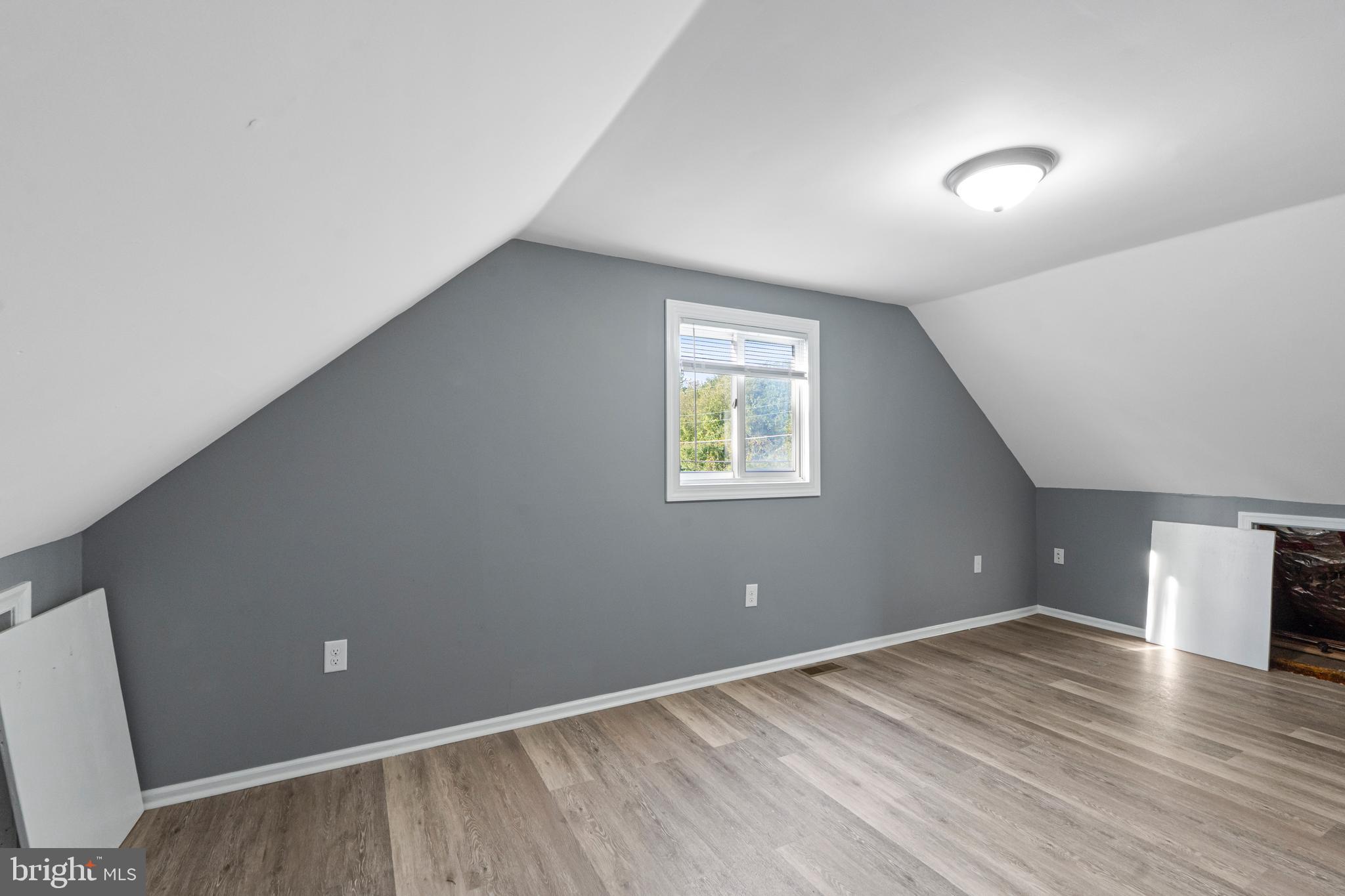 737 Watsontown Road Berlin, NJ 08009 - Photo 14 of 23 a view of room with window and wooden floor