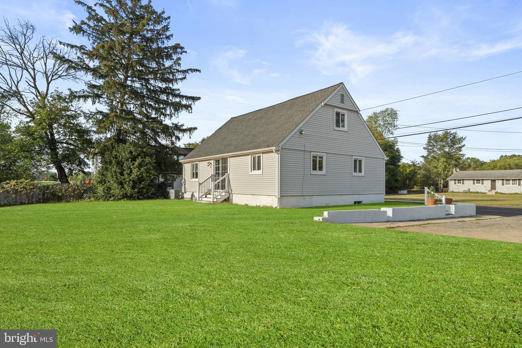 737 Watsontown Road Berlin, NJ 08009 - Photo 22 of 23 a front view of a house with garden