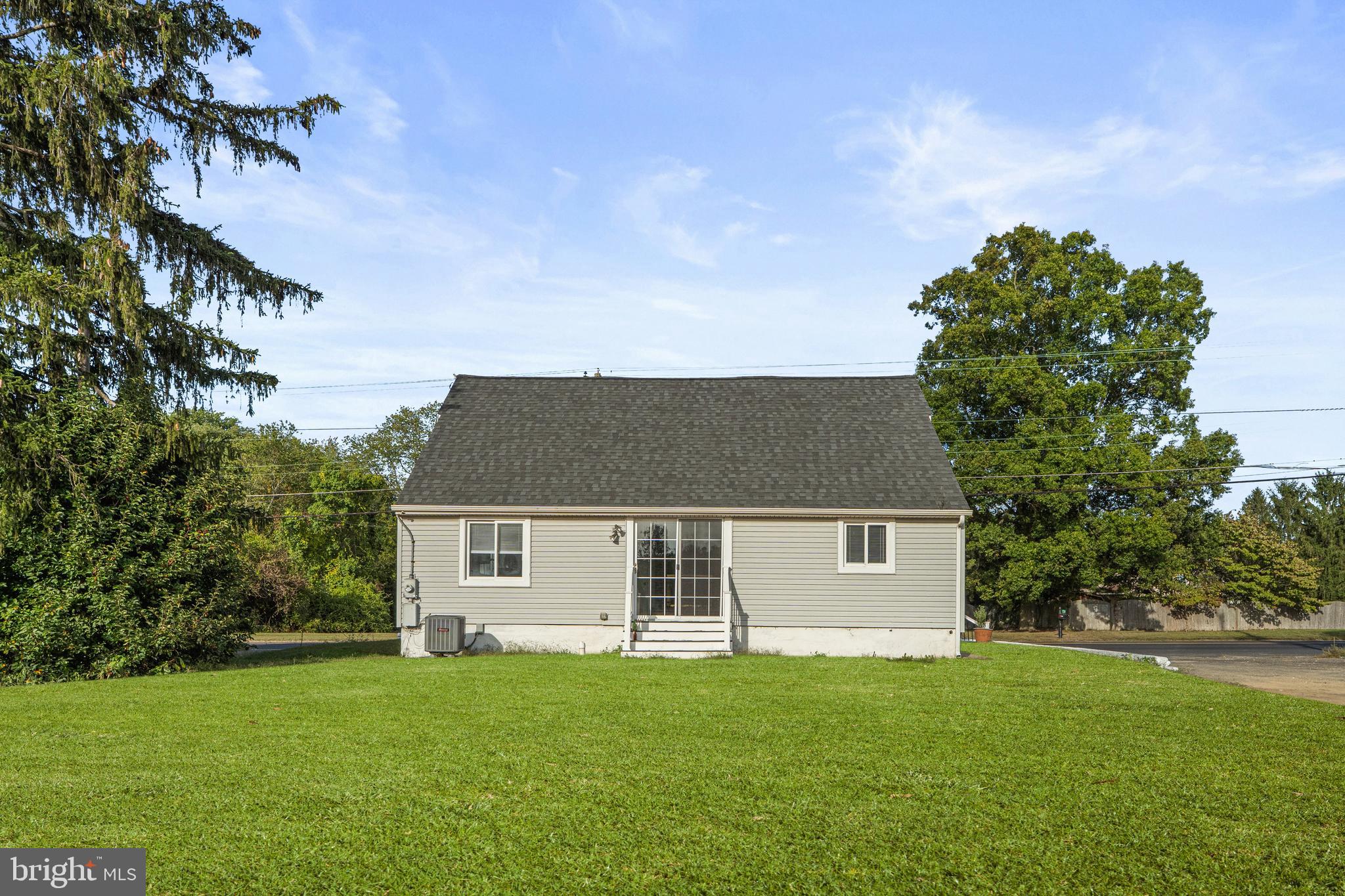 737 Watsontown Road Berlin, NJ 08009 - Photo 23 of 23 a front view of a house with a garden