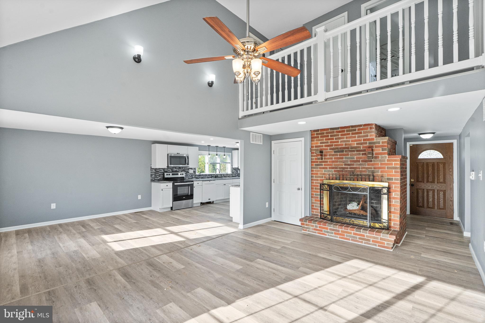737 Watsontown Road Berlin, NJ 08009 - Photo 4 of 23 a view of a livingroom with a fireplace