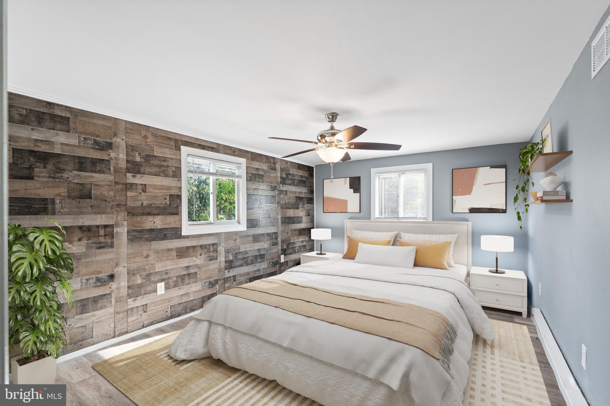 737 Watsontown Road Berlin, NJ 08009 - Photo 7 of 23 a bedroom with a large bed and a window