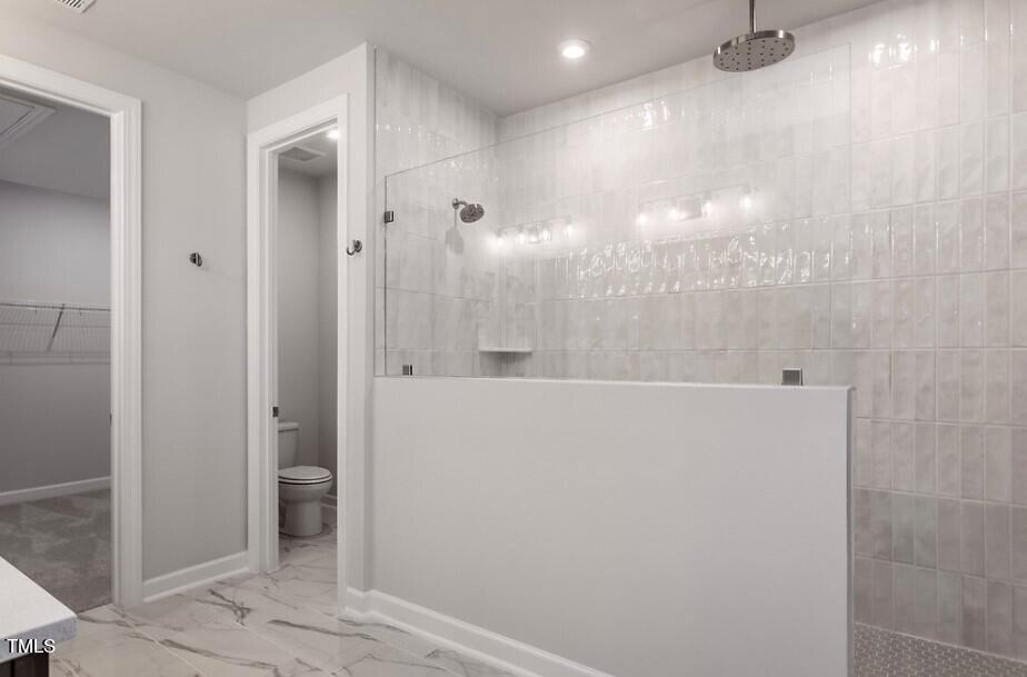 6103 Adecor Way Raleigh, NC 27617 - Photo 22 of 27 a bathroom with a shower