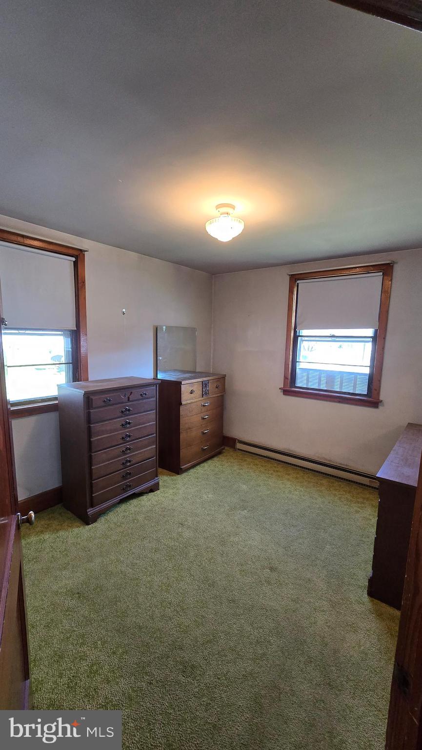 1077 Paper Mill Road Chambersburg, PA 17202 - Photo 15 of 32 a view of room with stairs