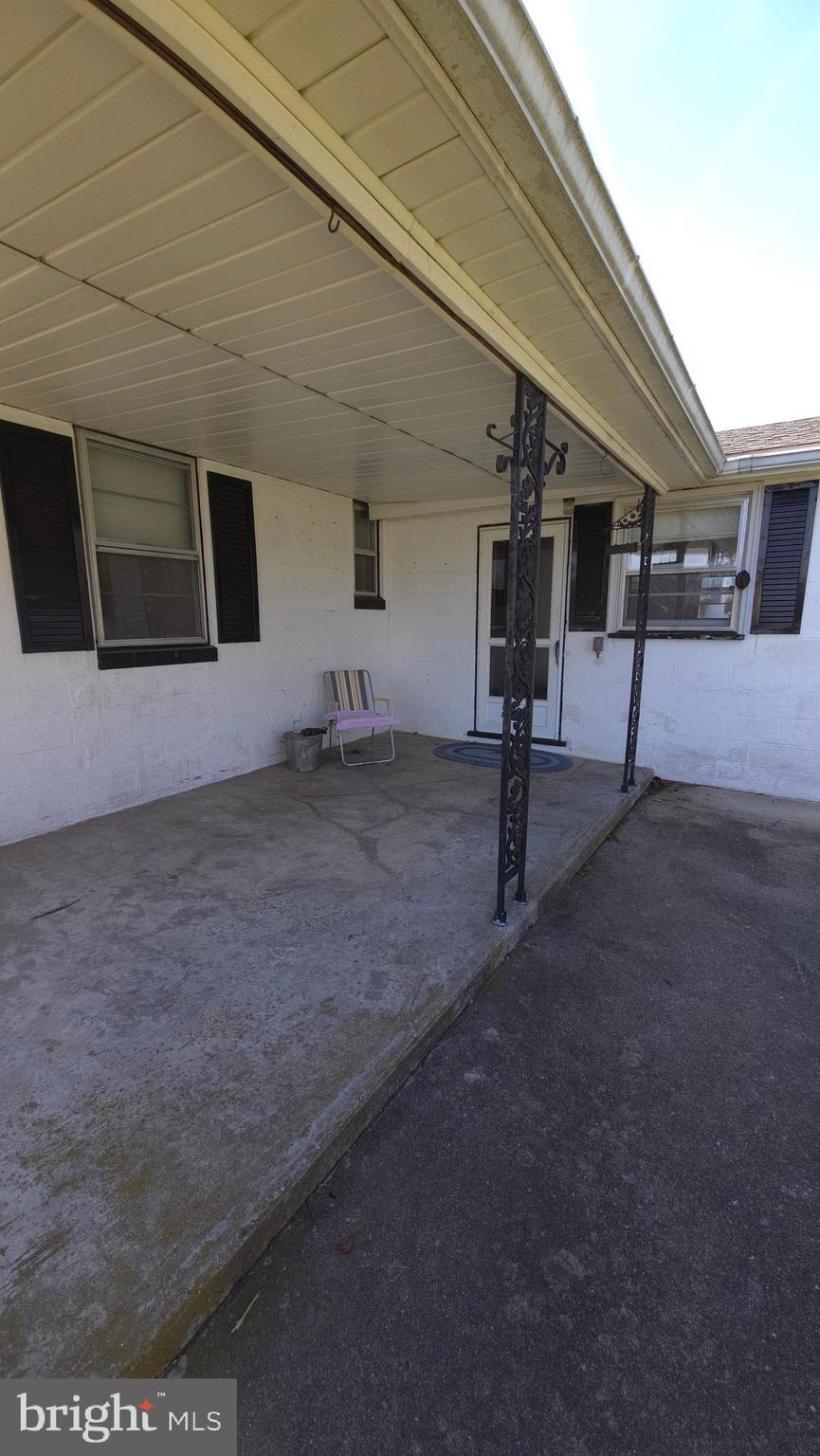 1077 Paper Mill Road Chambersburg, PA 17202 - Photo 30 of 32 a view of empty room with stairs