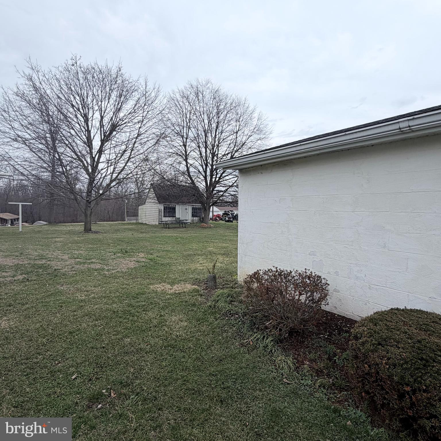 1077 Paper Mill Road Chambersburg, PA 17202 - Photo 3 of 32 a backyard of a house with lots of green space