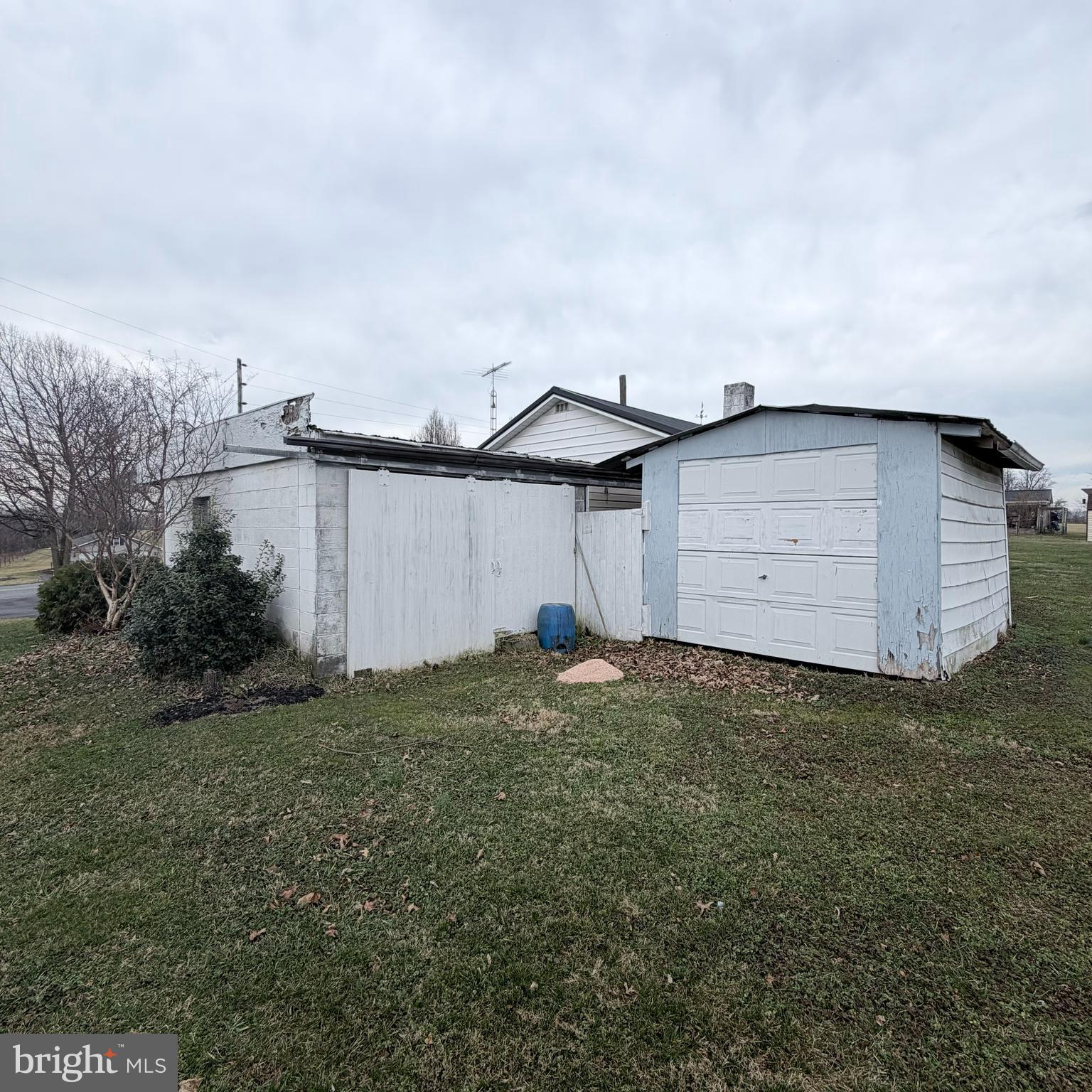 1077 Paper Mill Road Chambersburg, PA 17202 - Photo 5 of 32 a backyard of a house with plants and garden