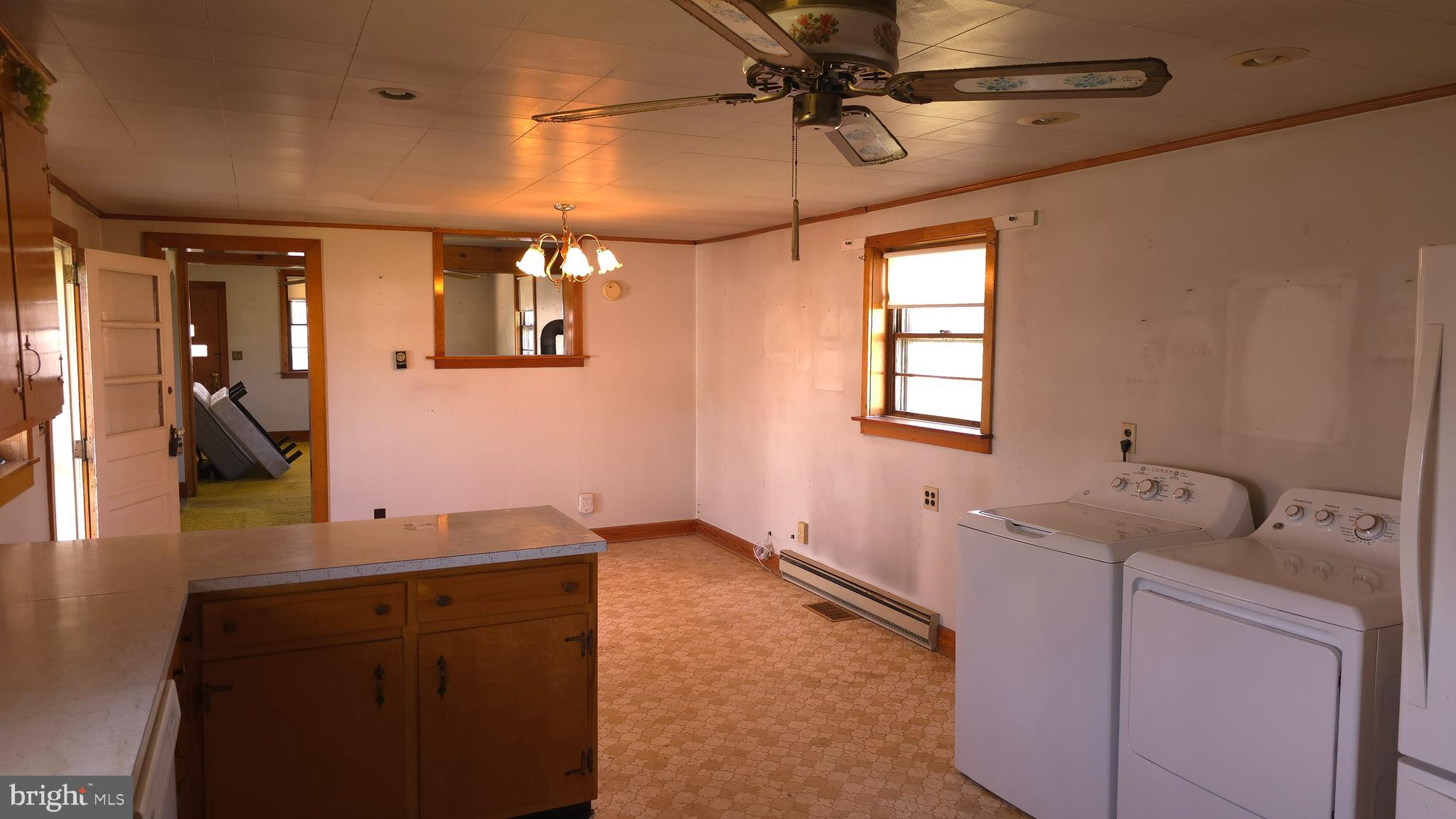 1077 Paper Mill Road Chambersburg, PA 17202 - Photo 8 of 32 a bathroom with a sink vanity and mirror