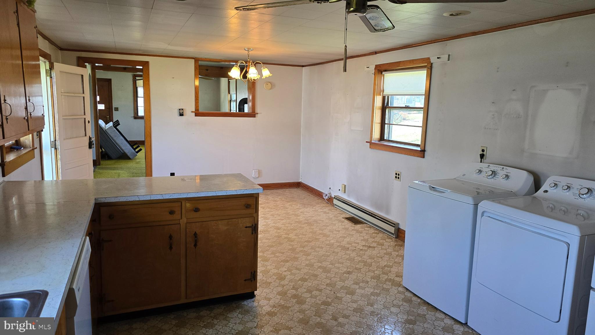 1077 Paper Mill Road Chambersburg, PA 17202 - Photo 9 of 32 a room with two washing machine