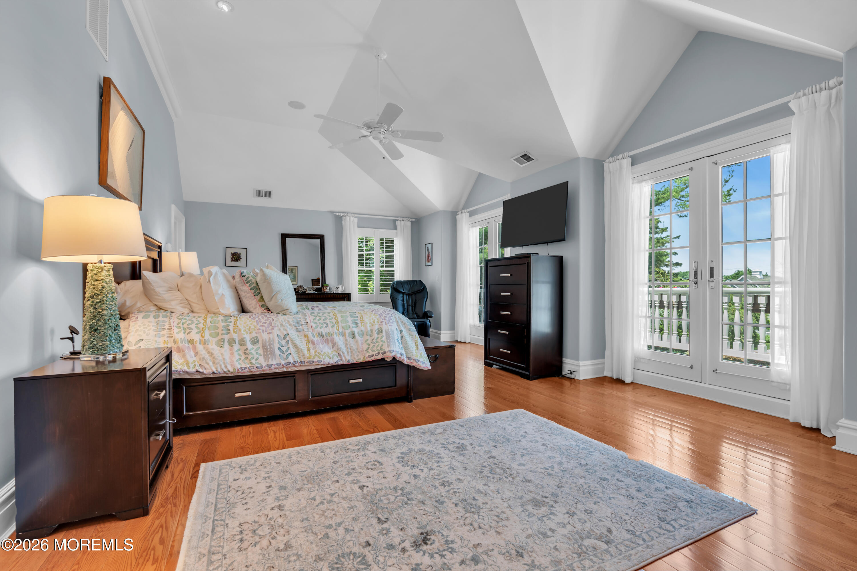 600 Little Silver Point Road Little Silver, NJ 07739 - Photo 32 of 55 a bedroom with a large bed and a couch