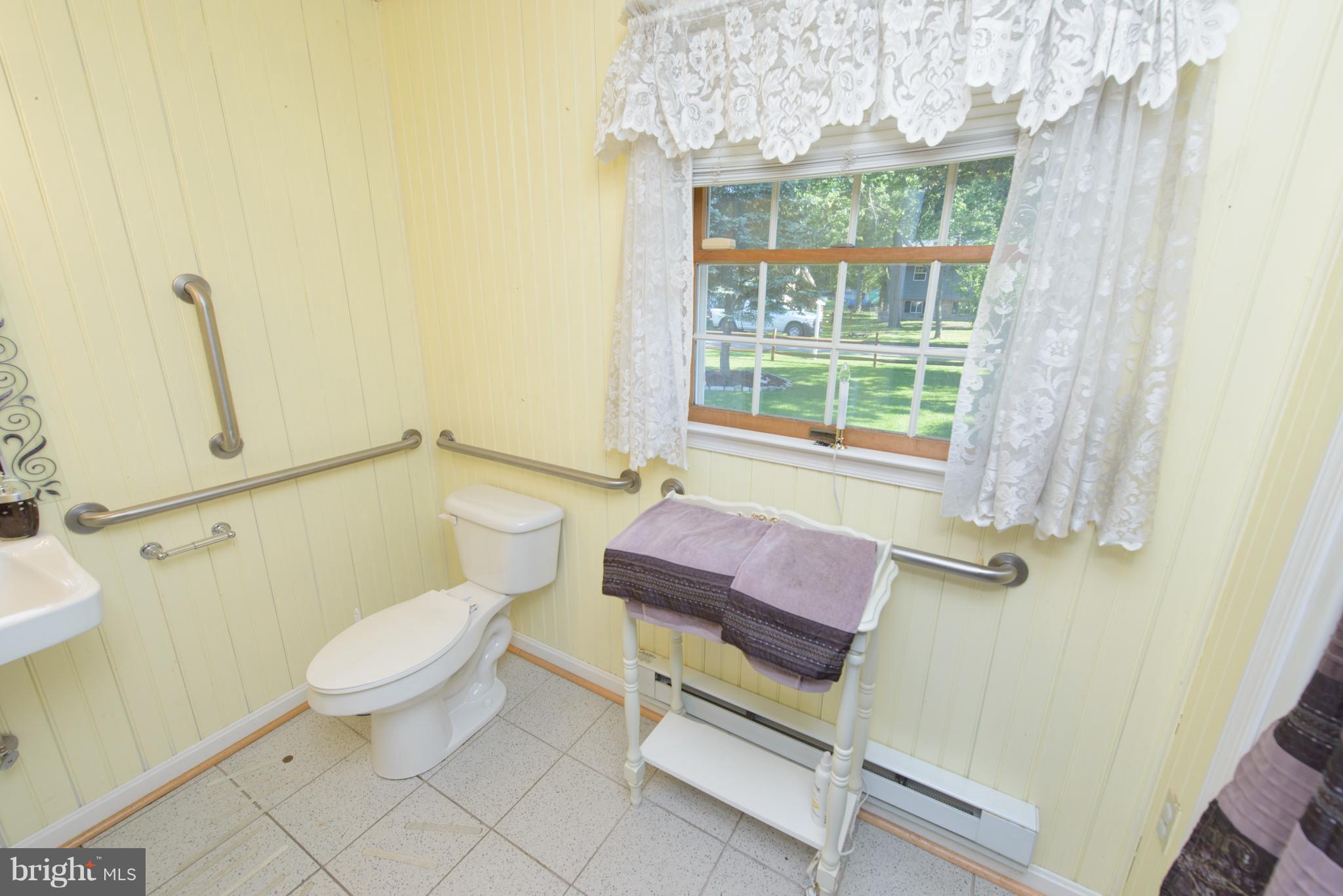 7860 West Riverside Drive Pasadena, MD 21122 - Photo 18 of 28 Huge Bathroom with extra-large doors