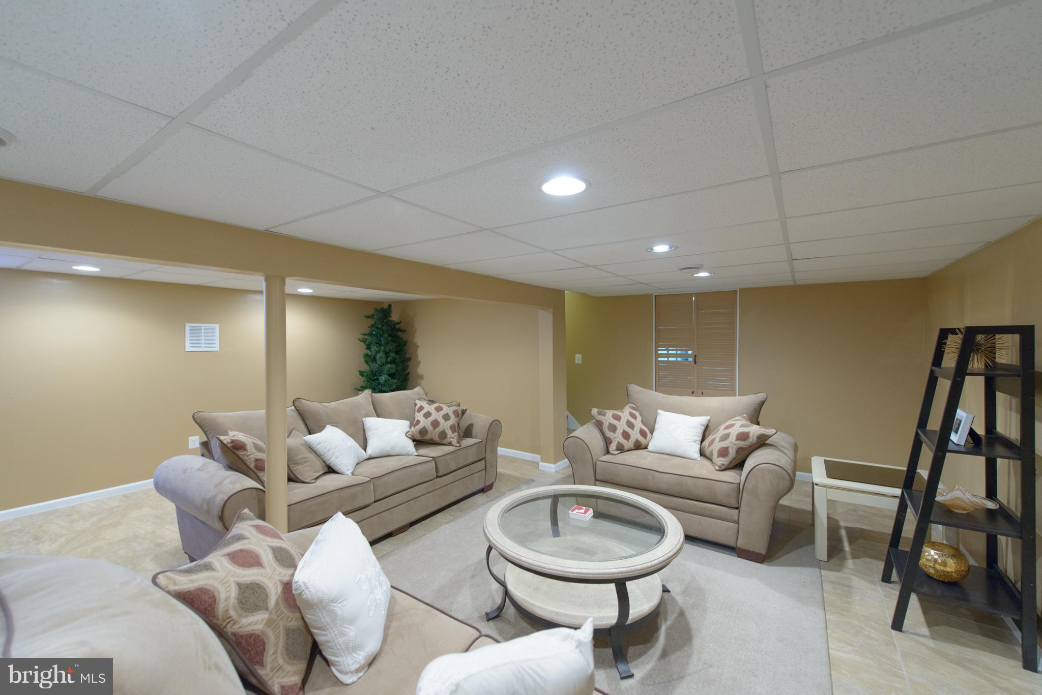 7860 West Riverside Drive Pasadena, MD 21122 - Photo 25 of 28 Finished Basement