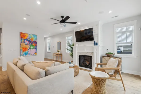 a kitchen with kitchen island a dining table and a stove