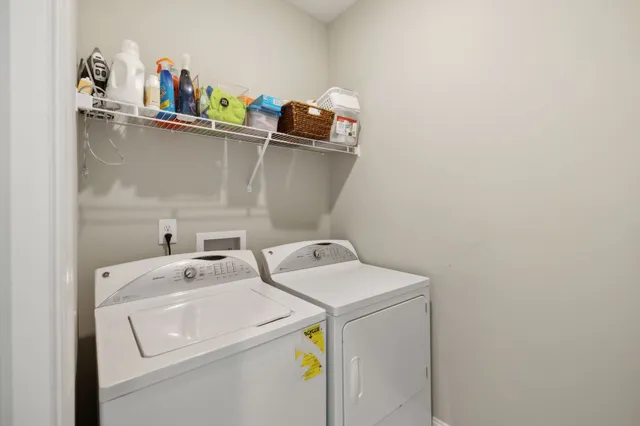 a view of a hallway with seating area