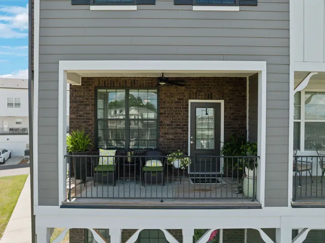 a view of a porch with wooden floor