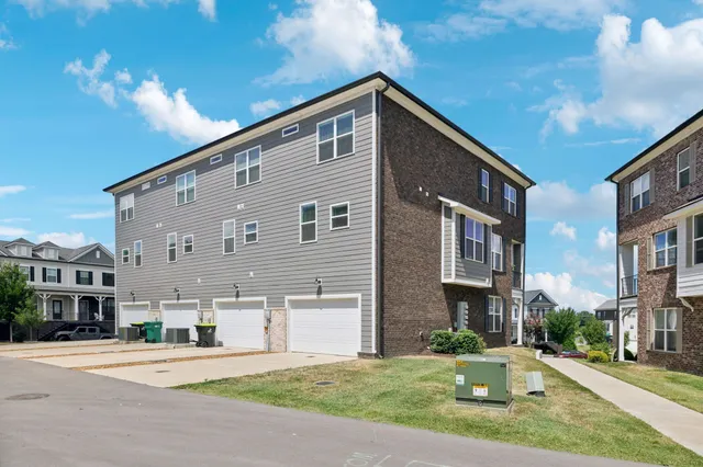 a view of a city with lawn chairs