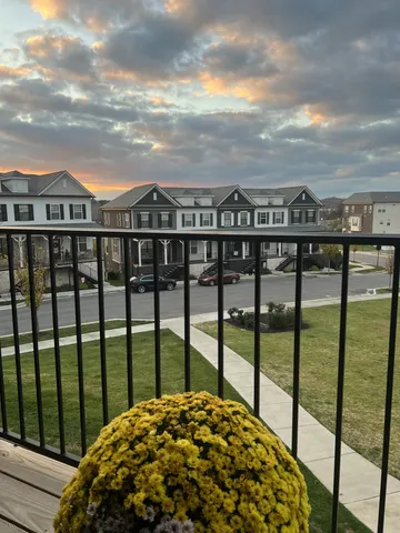 a view of a balcony with city view