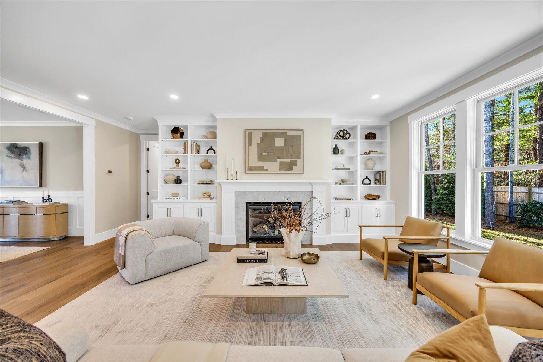 6 Willow Circle Mashpee, MA 02649 - Photo 13 of 41 a living room with furniture and a fireplace
