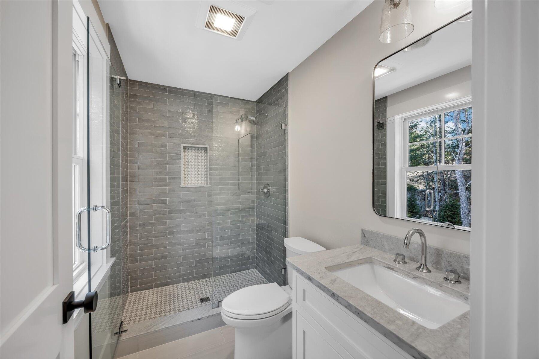 6 Willow Circle Mashpee, MA 02649 - Photo 35 of 41 a bathroom with a sink a toilet and shower