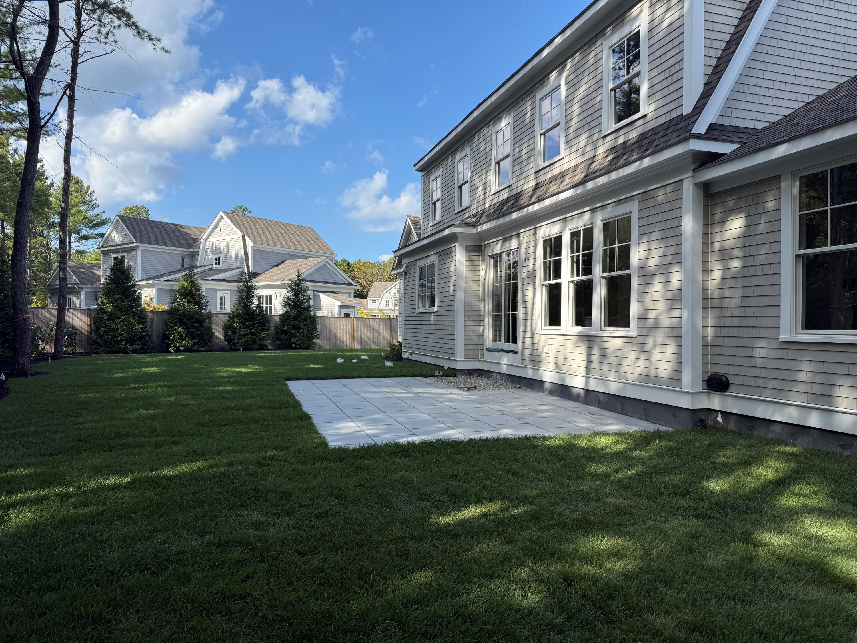 6 Willow Circle Mashpee, MA 02649 - Photo 5 of 41 a view of a house with a yard