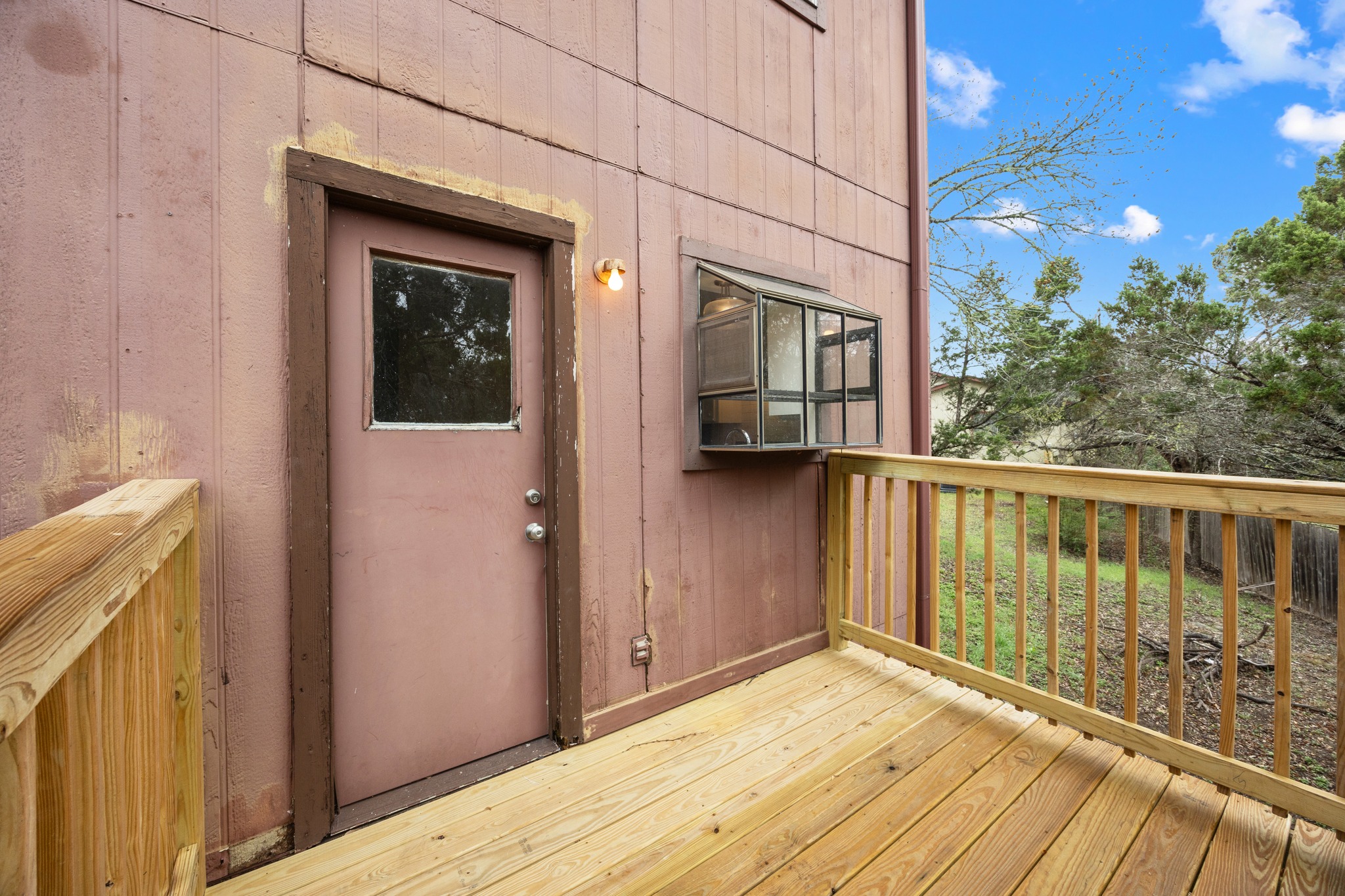 6904 Rifle Bend, Unit A Austin, TX 78736 - Photo 15 of 22 View of wooden deck