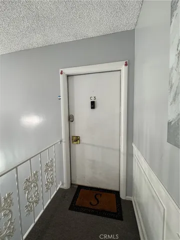 a view of entryway with stairs