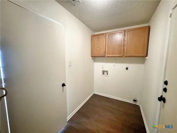a view of small space with wooden floor