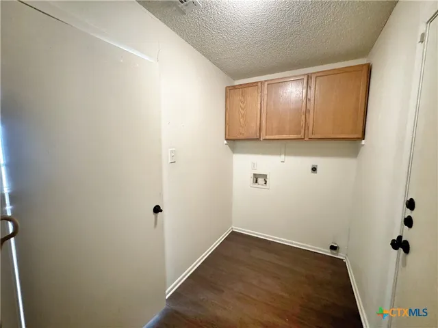 a view of small space with wooden floor