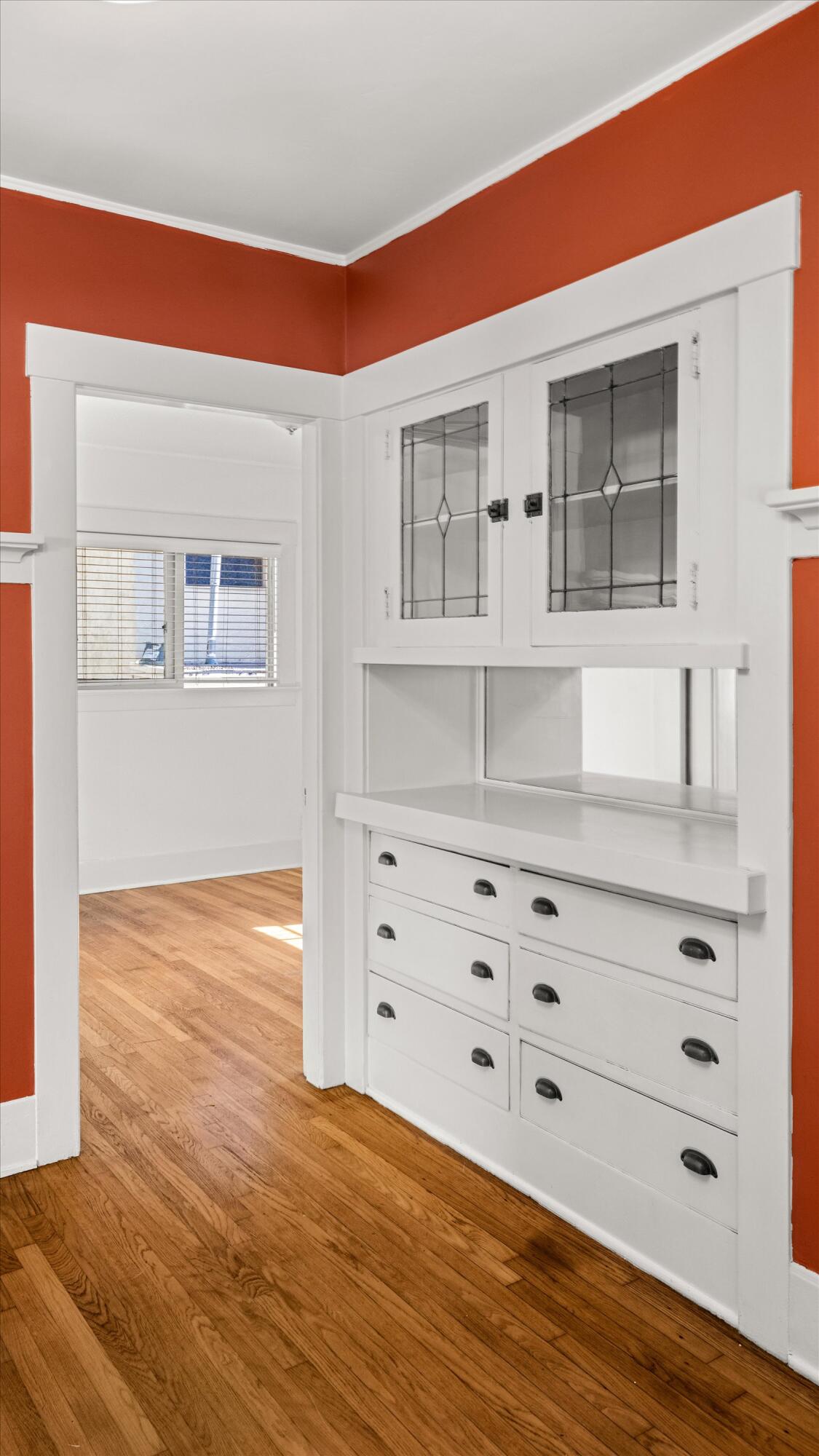 1620 De La Vina Street Santa Barbara, CA 93101 - Photo 14 of 46 a view of an empty room with wooden floor and cabinet