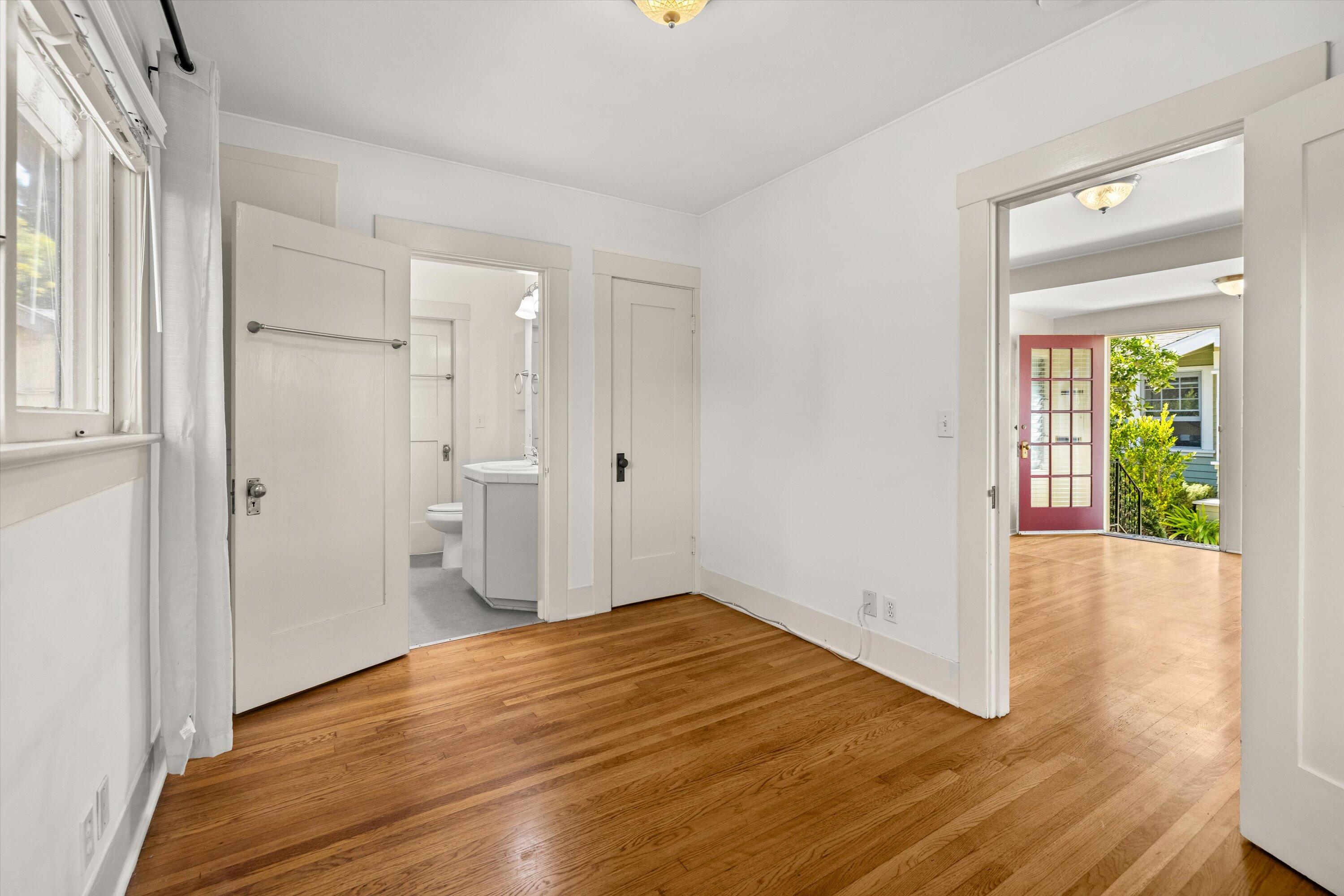 1620 De La Vina Street Santa Barbara, CA 93101 - Photo 15 of 46 a view of an empty room with wooden floor and a window