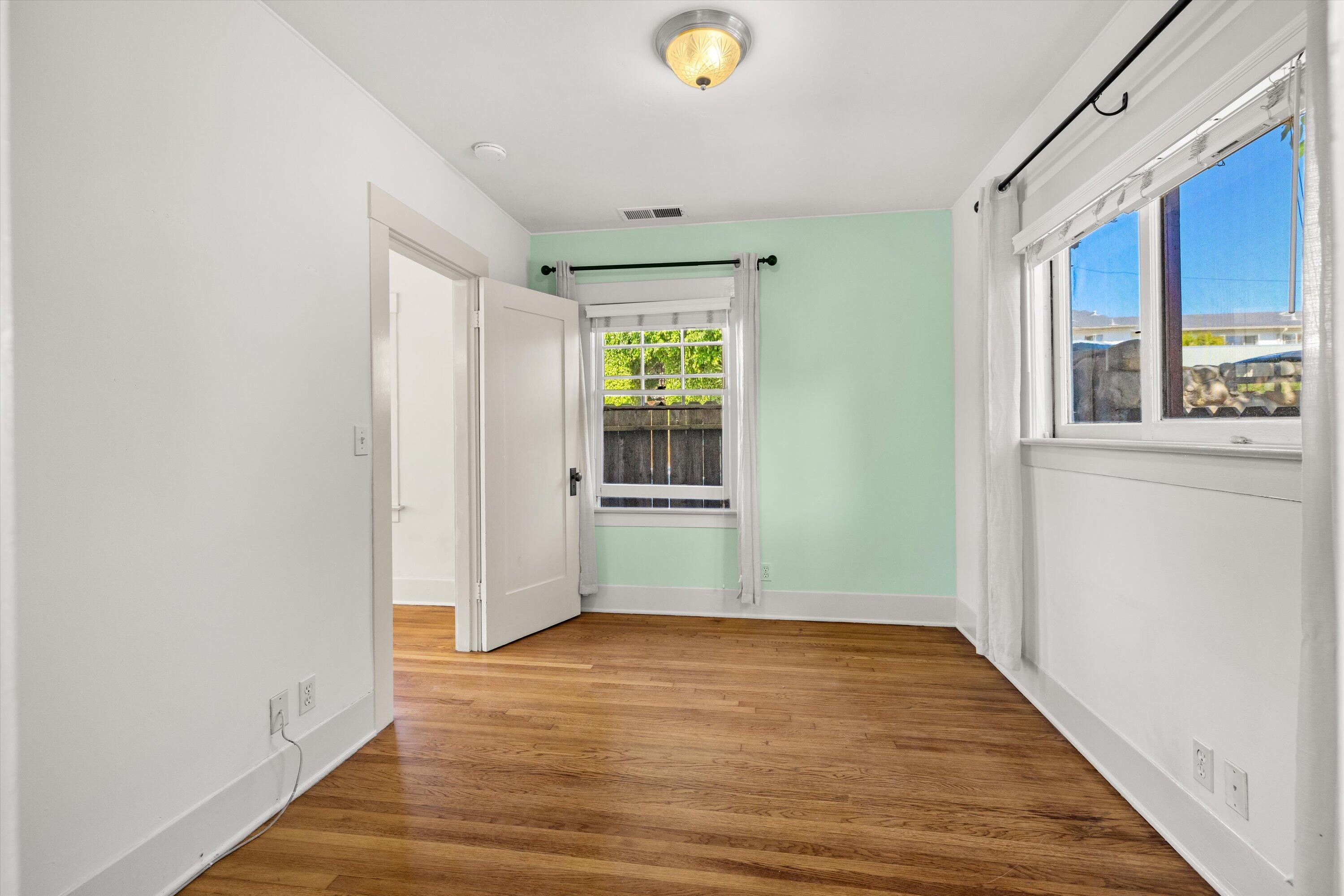1620 De La Vina Street Santa Barbara, CA 93101 - Photo 19 of 46 a view of empty room with wooden floor and fan