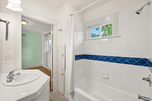 a bathroom with a sink and a bathtub