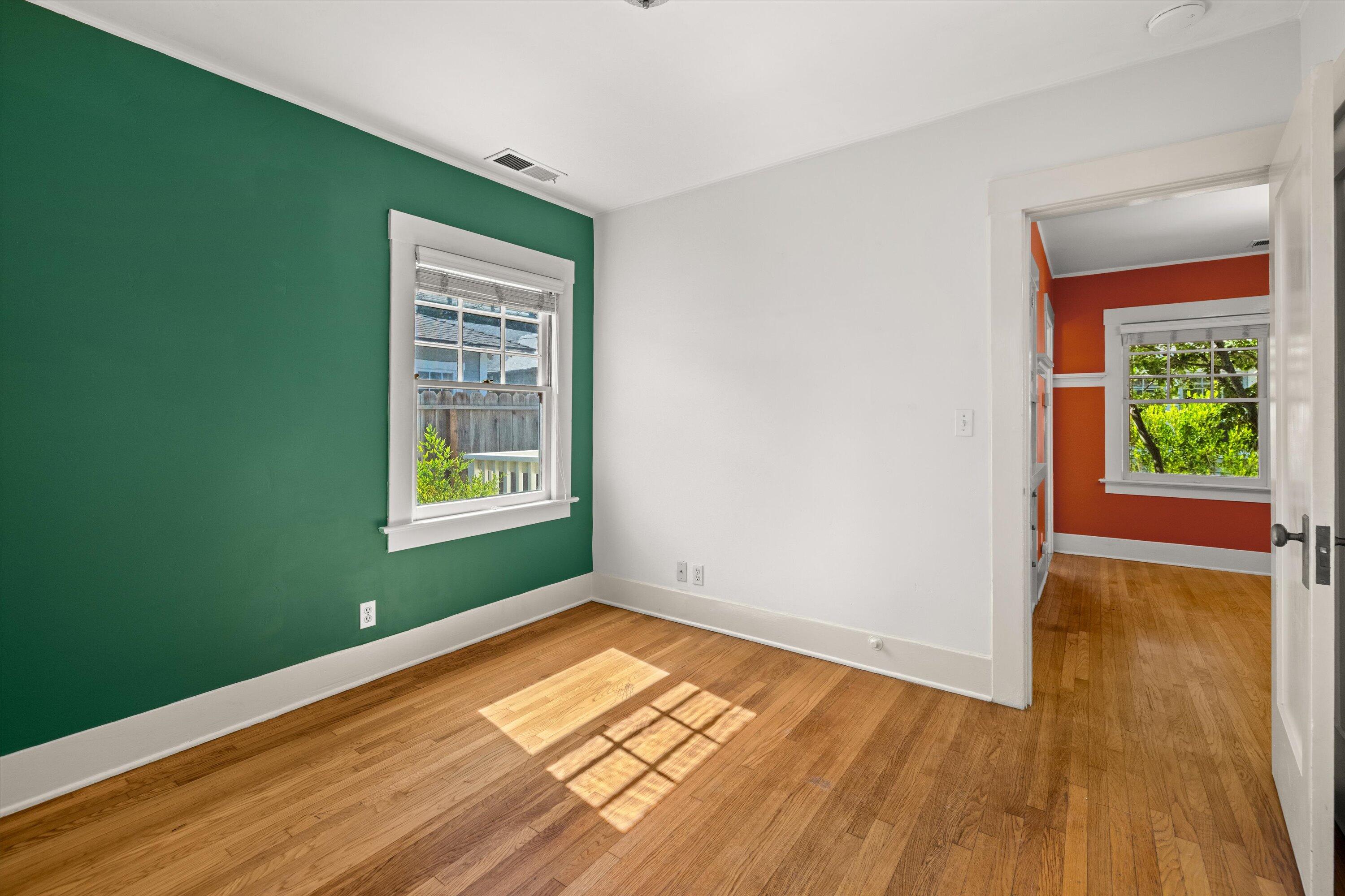 1620 De La Vina Street Santa Barbara, CA 93101 - Photo 24 of 46 a view of an empty room with wooden floor and a window
