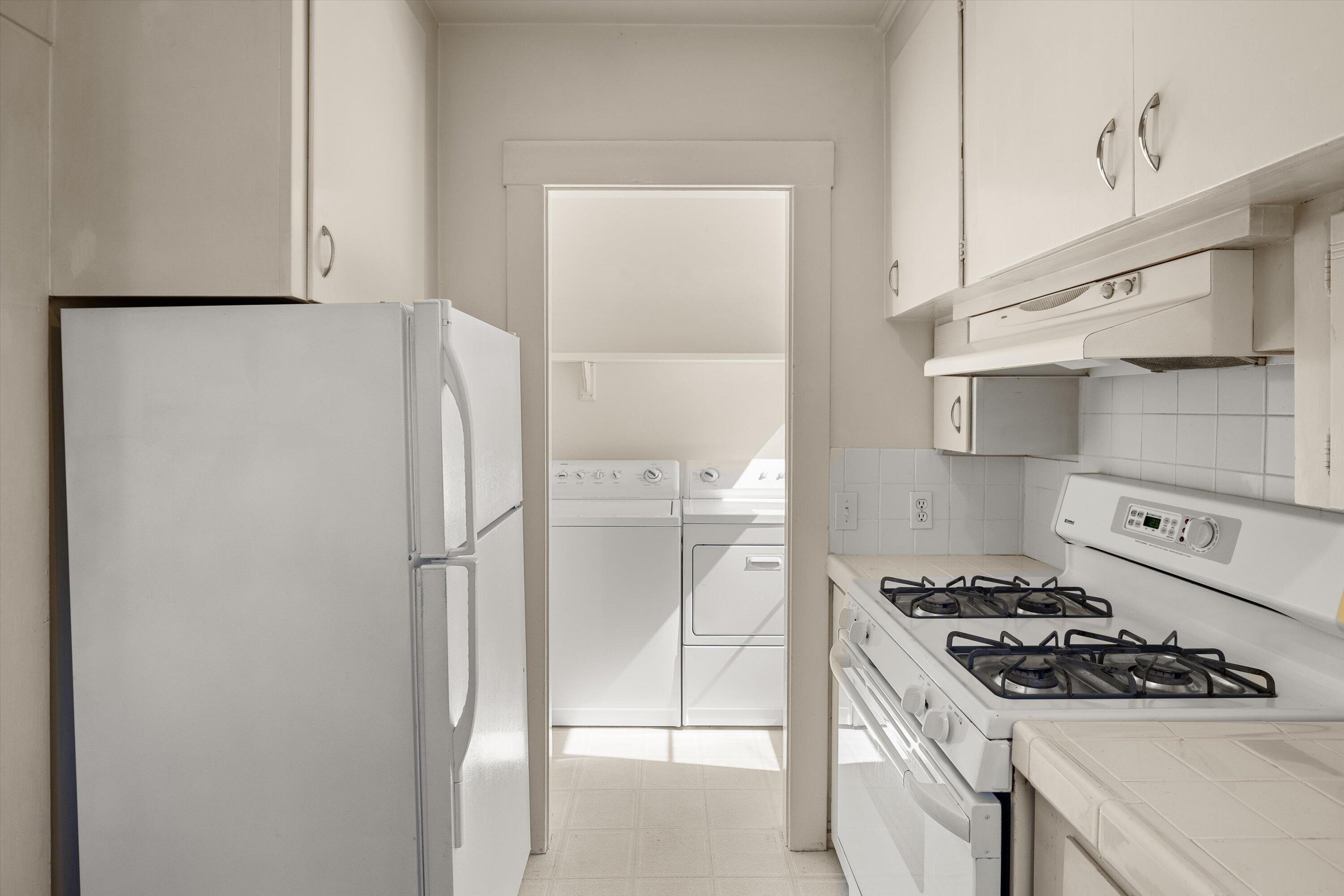1620 De La Vina Street Santa Barbara, CA 93101 - Photo 33 of 46 a kitchen with a stove and a refrigerator