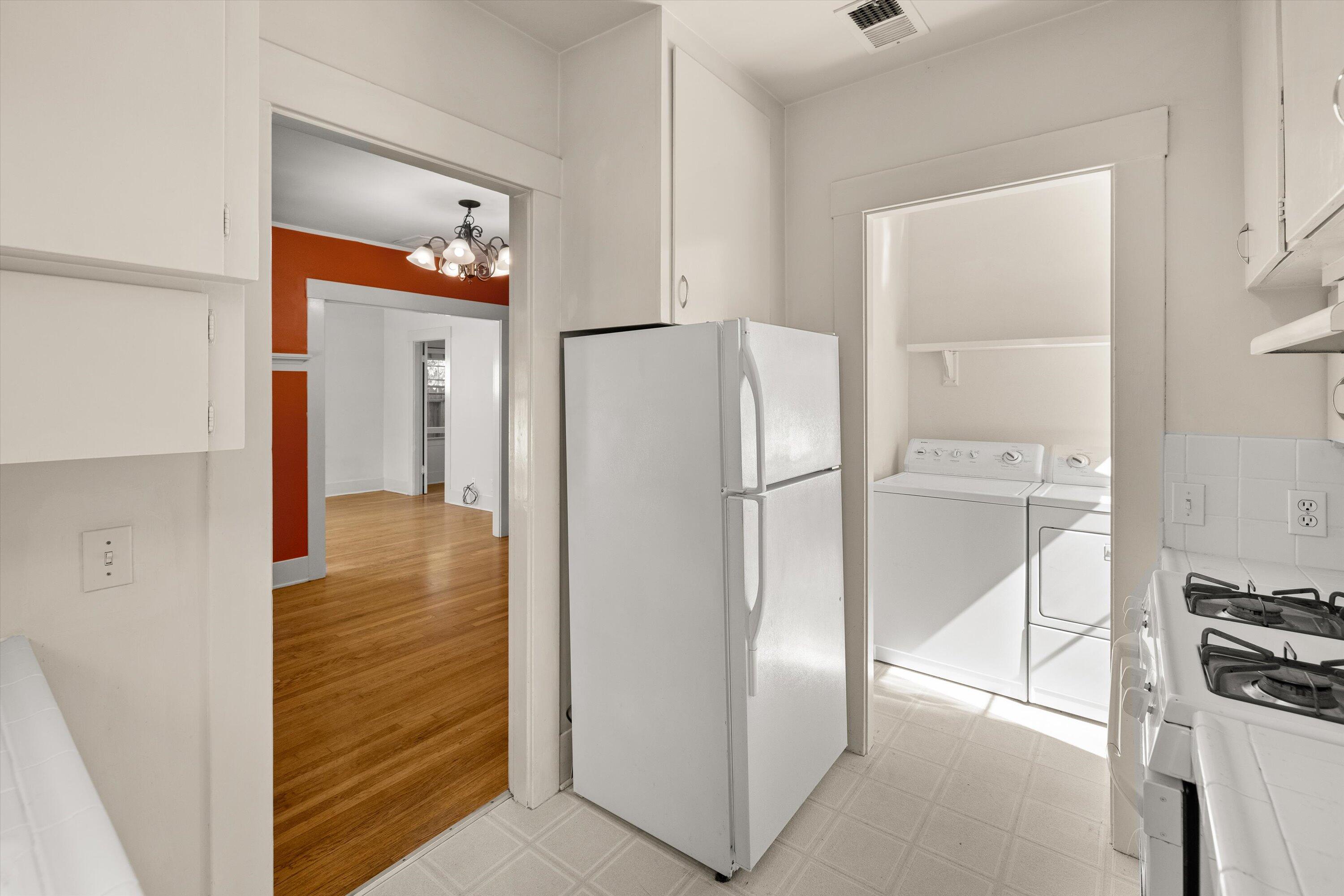 1620 De La Vina Street Santa Barbara, CA 93101 - Photo 34 of 46 a kitchen with a refrigerator and a stove top oven