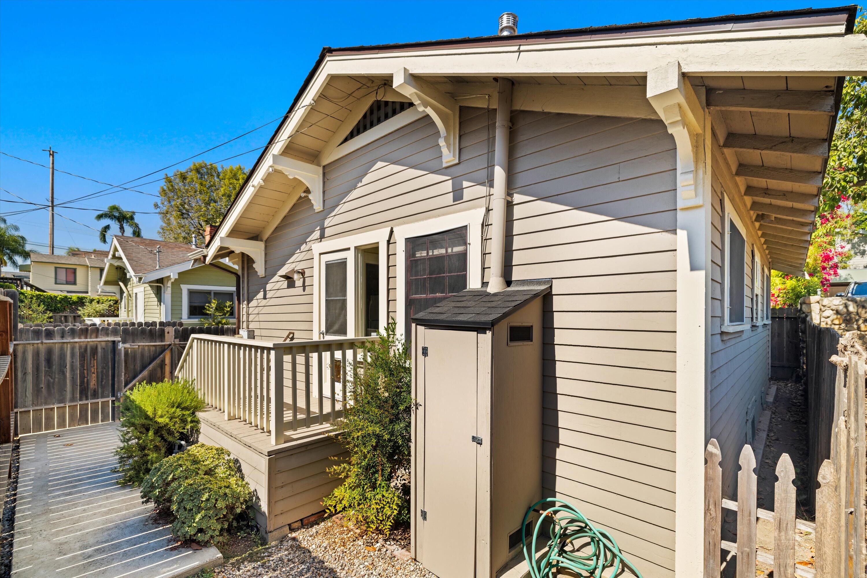 1620 De La Vina Street Santa Barbara, CA 93101 - Photo 37 of 46 a view of a house with a small yard and wooden floor and fence