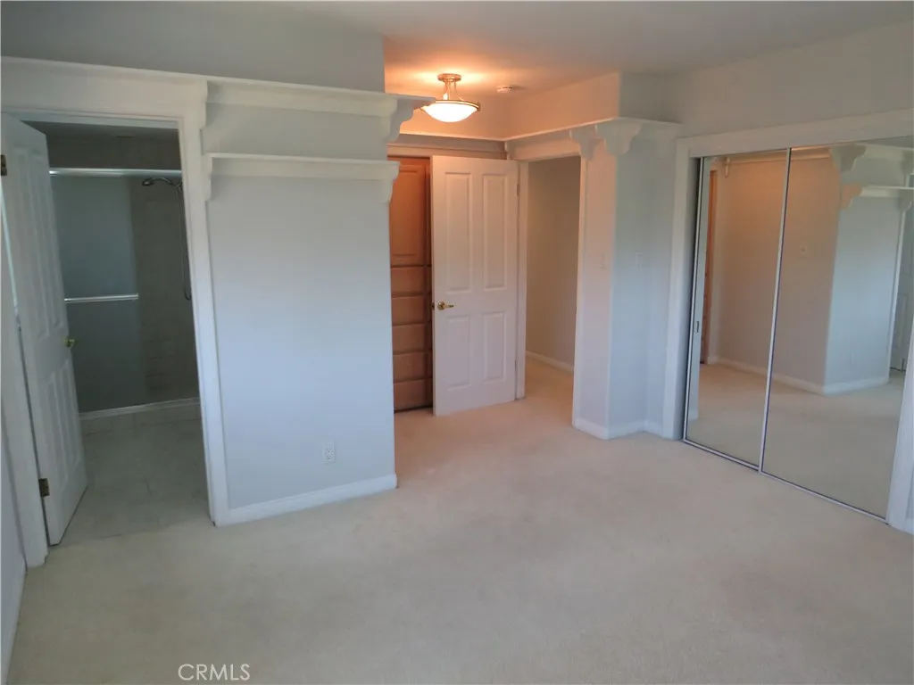 2507 Sunnyside Ridge Road Rancho Palos Verdes, CA 90275 - Photo 11 of 28 an empty room with closet and a fan