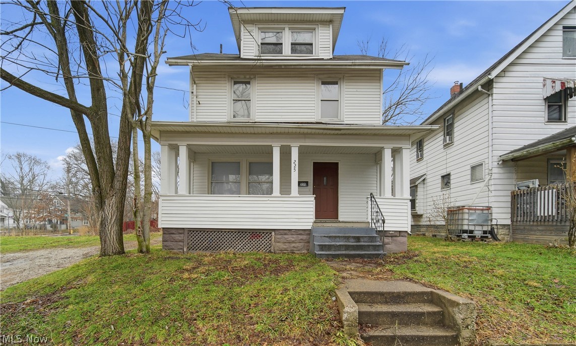 225 Cranz Place Akron, OH 44310 - Photo 1 of 34 Traditional style home featuring covered porch and a front yard