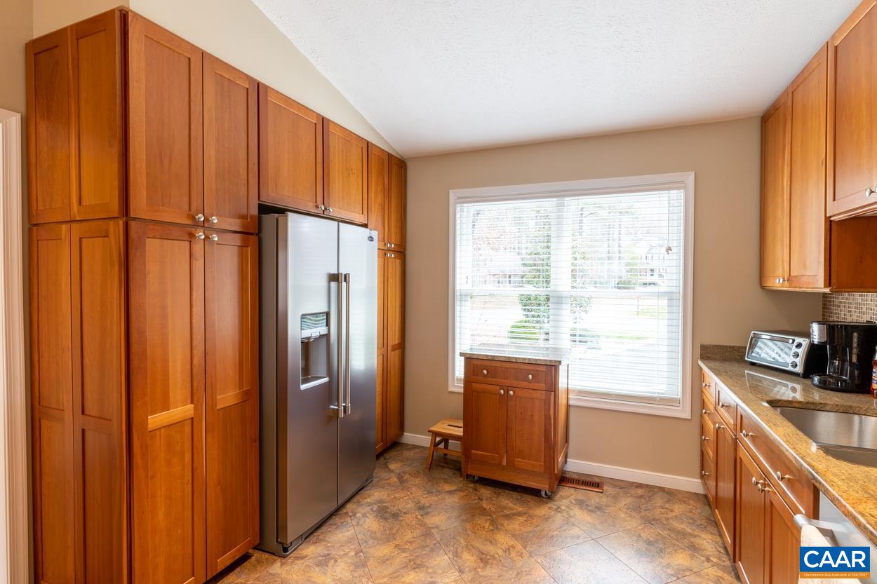 938 Jefferson Drive Palmyra, VA 22963 - Photo 12 of 50 a kitchen with stainless steel appliances granite countertop a refrigerator and a stove top oven