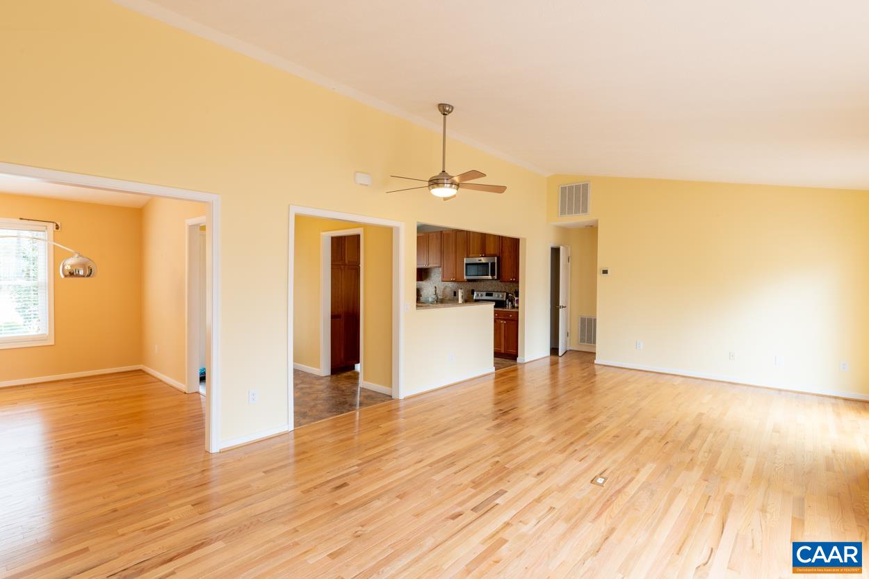 938 Jefferson Drive Palmyra, VA 22963 - Photo 14 of 50 a view of an empty room with kitchen and a window