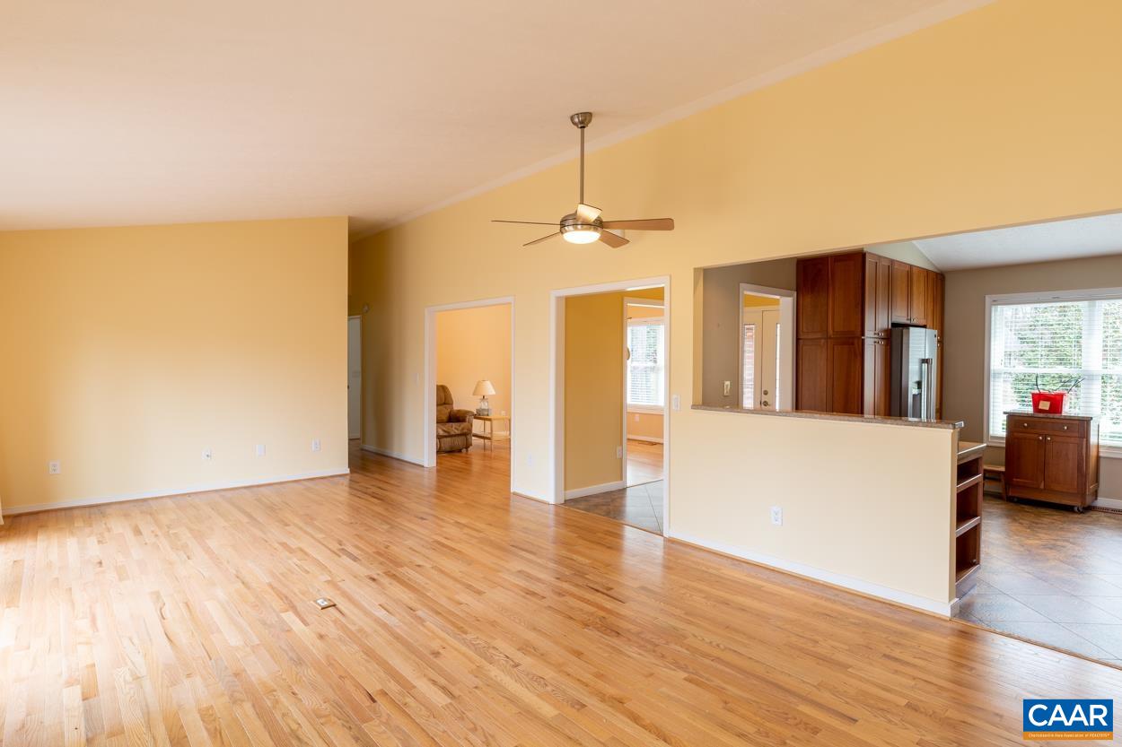 938 Jefferson Drive Palmyra, VA 22963 - Photo 15 of 50 a view of a living room a kitchen and wooden floor