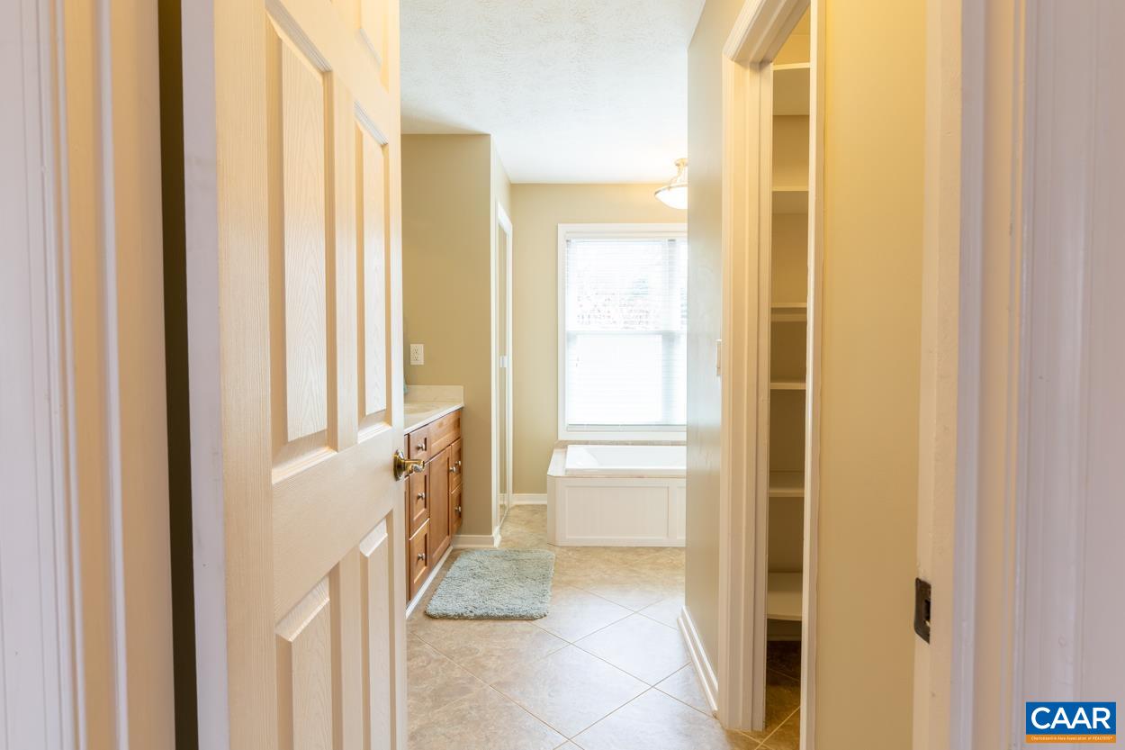 938 Jefferson Drive Palmyra, VA 22963 - Photo 20 of 50 a bathroom with a tub and shower