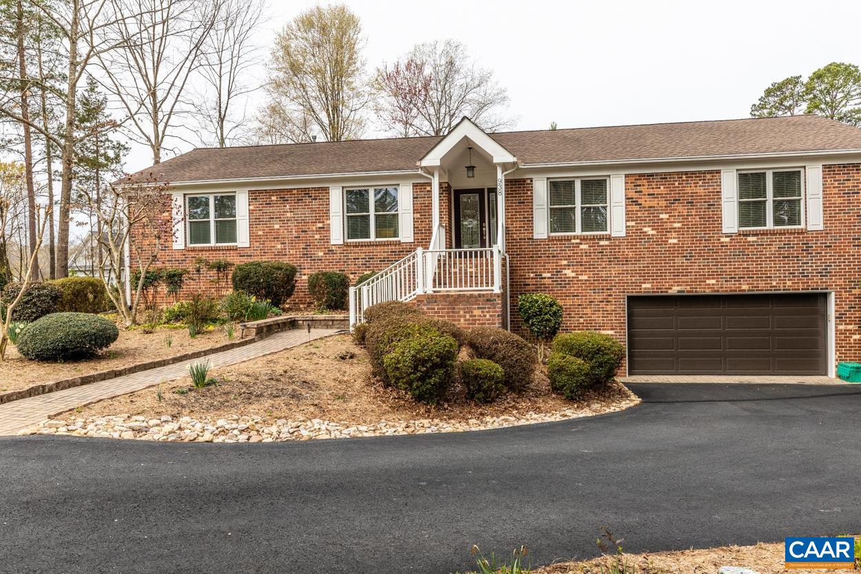 938 Jefferson Drive Palmyra, VA 22963 - Photo 2 of 50 a front view of a house with a yard and garage