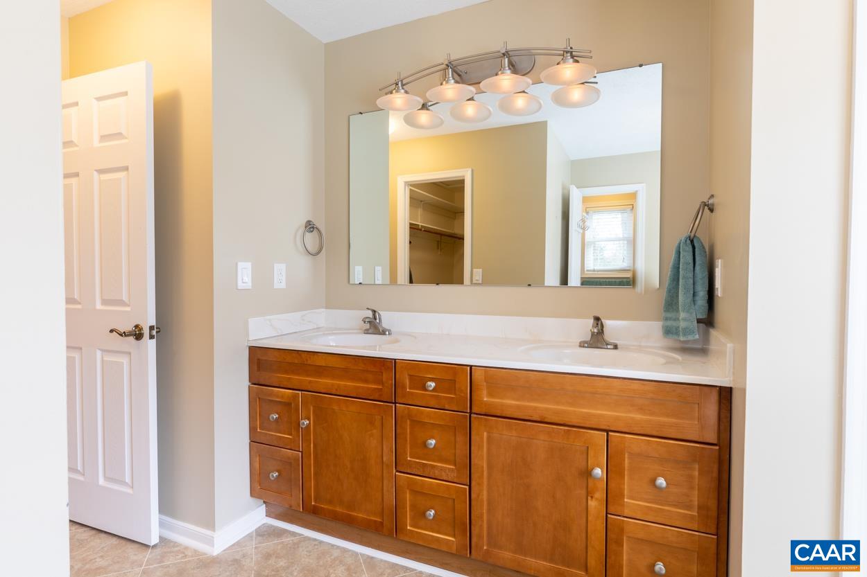 938 Jefferson Drive Palmyra, VA 22963 - Photo 21 of 50 a bathroom with a sink and a mirror