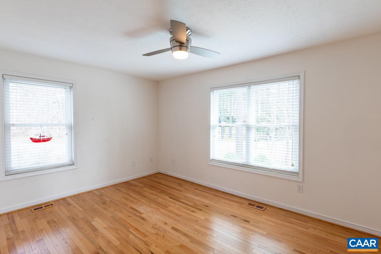 938 Jefferson Drive Palmyra, VA 22963 - Photo 25 of 50 a view of empty room with wooden floor and fan