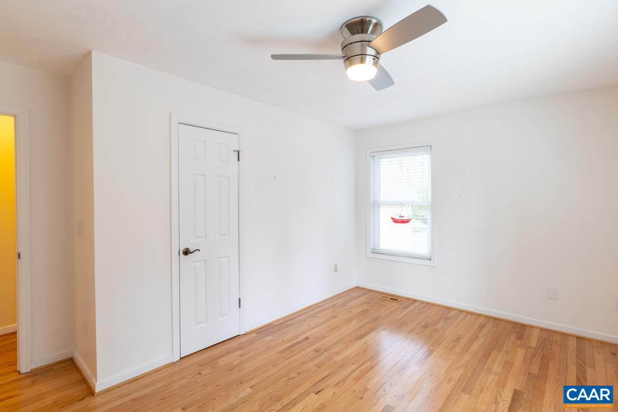 938 Jefferson Drive Palmyra, VA 22963 - Photo 26 of 50 a view of empty room with wooden floor and fan