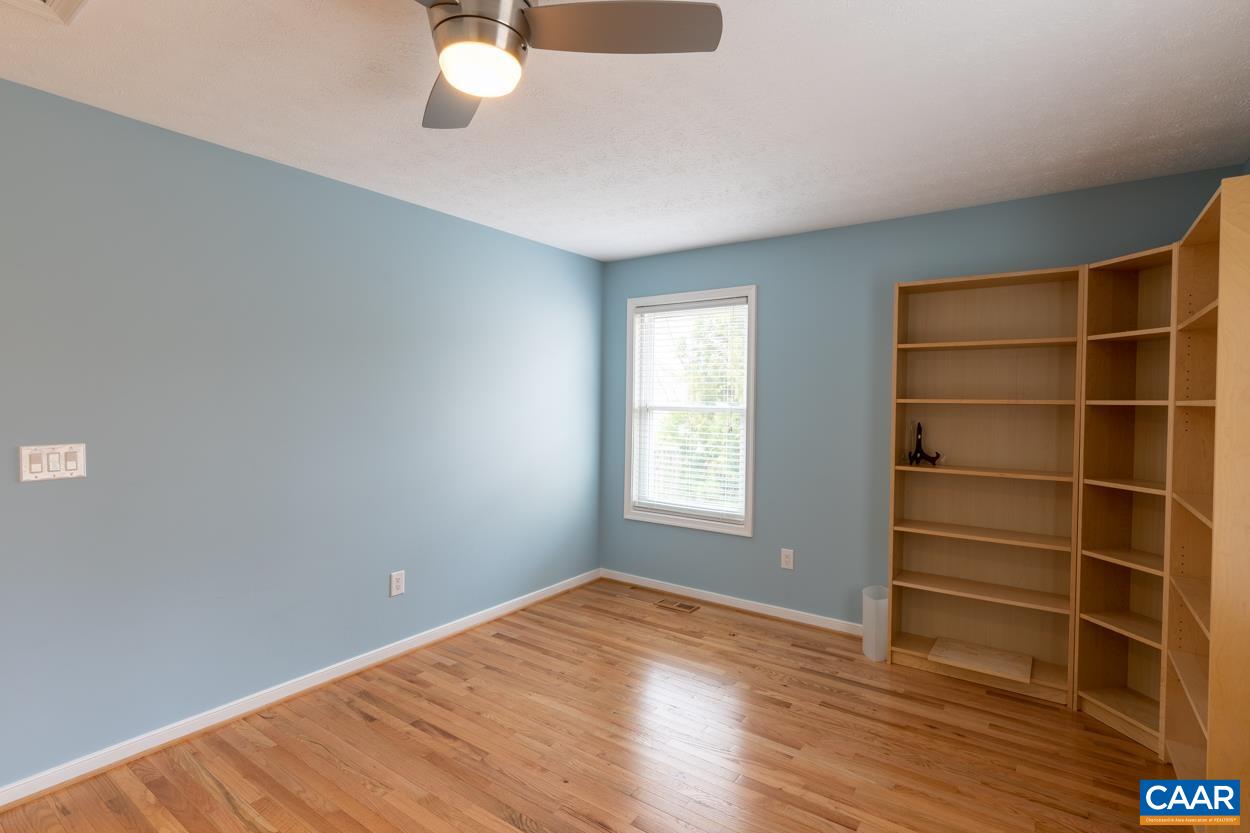 938 Jefferson Drive Palmyra, VA 22963 - Photo 27 of 50 a view of an empty room with a window and wooden floor