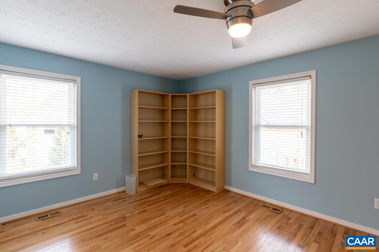 938 Jefferson Drive Palmyra, VA 22963 - Photo 28 of 50 a view of an empty room with a window and wooden floor