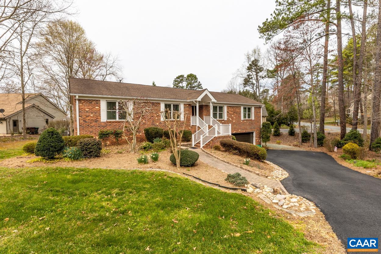 938 Jefferson Drive Palmyra, VA 22963 - Photo 3 of 50 a front view of a house with yard patio and fire pit