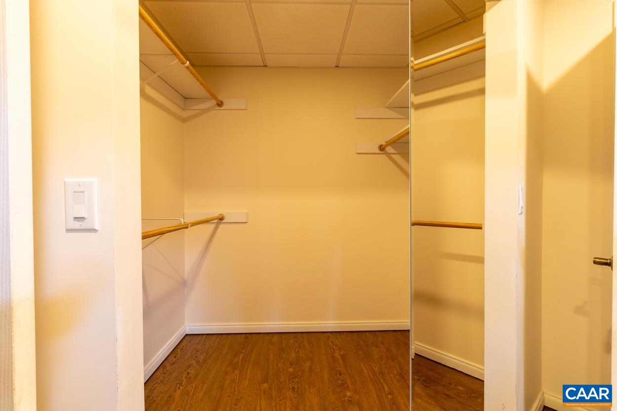 938 Jefferson Drive Palmyra, VA 22963 - Photo 38 of 50 a view of walk in closet with wooden floor