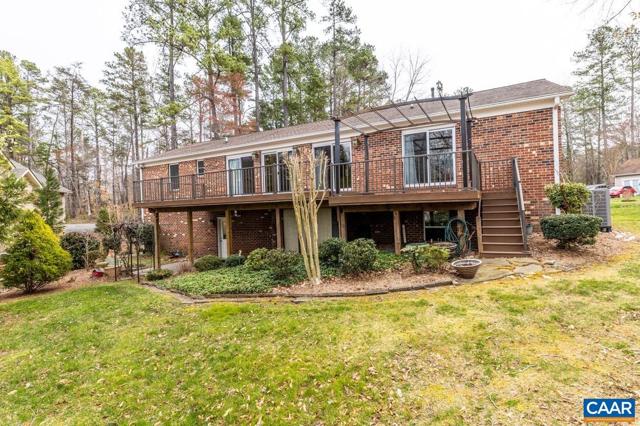 938 Jefferson Drive Palmyra, VA 22963 - Photo 46 of 50 a front view of a house with garden